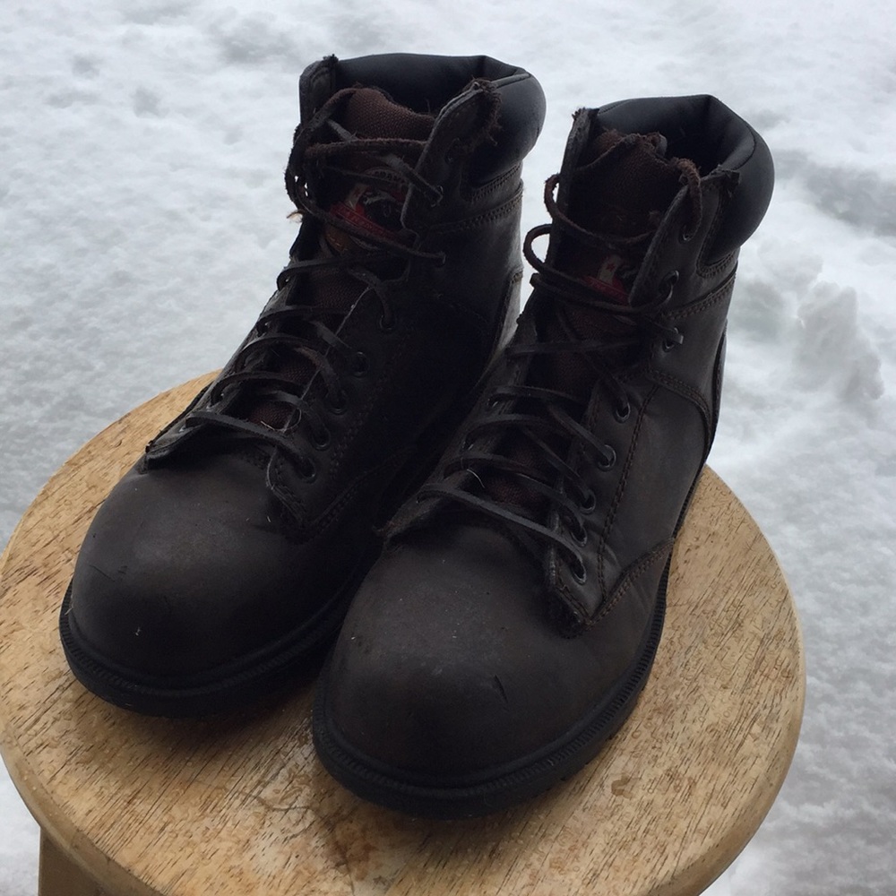 Steel toed work boots with leather shoestrings